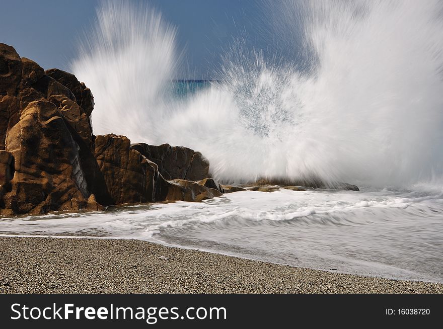 Waves splash in Deiva Marina, Liguria. Waves splash in Deiva Marina, Liguria