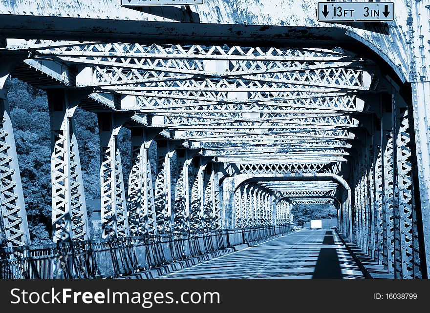 Old metal bridge in Pennsylvania in blue color tone