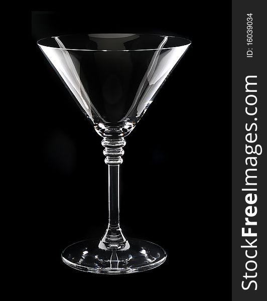 Empty glass isolated on black background. Empty glass isolated on black background