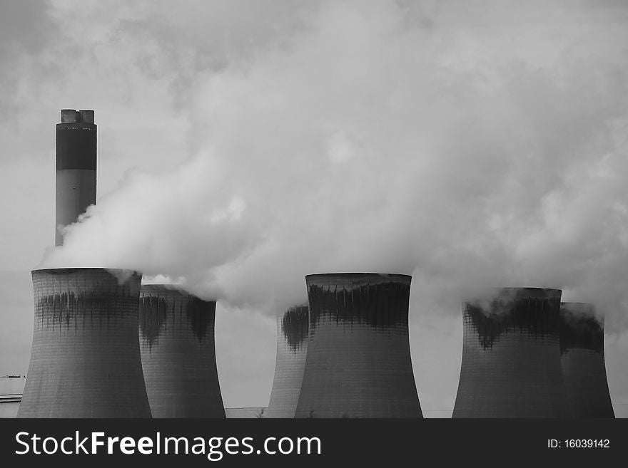 Steam rising from cooling towers at a coal fired power station
