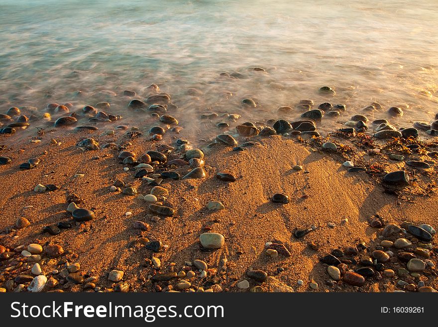 Sea with stones in nature