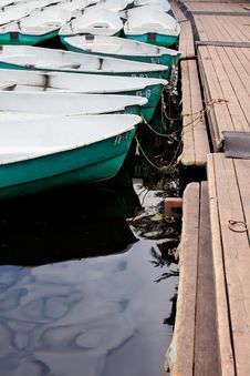 Boat On The Water Near The Pier Royalty Free Stock Photography Boat On The Water Near The Pier Royalty Free Stock Photography