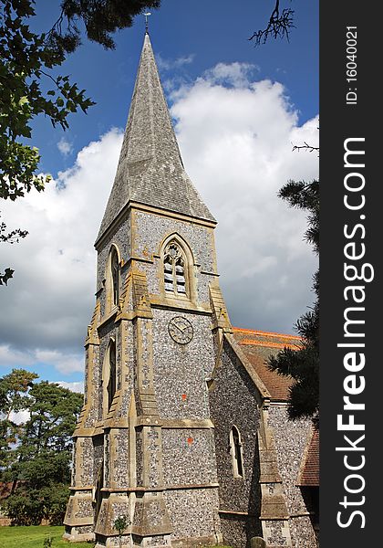 English Village Church ans Steeple with Clock. English Village Church ans Steeple with Clock
