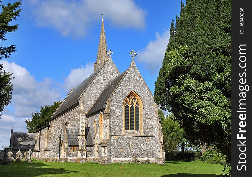 English Village Church ans Steeple viewed from the Graveyard. English Village Church ans Steeple viewed from the Graveyard