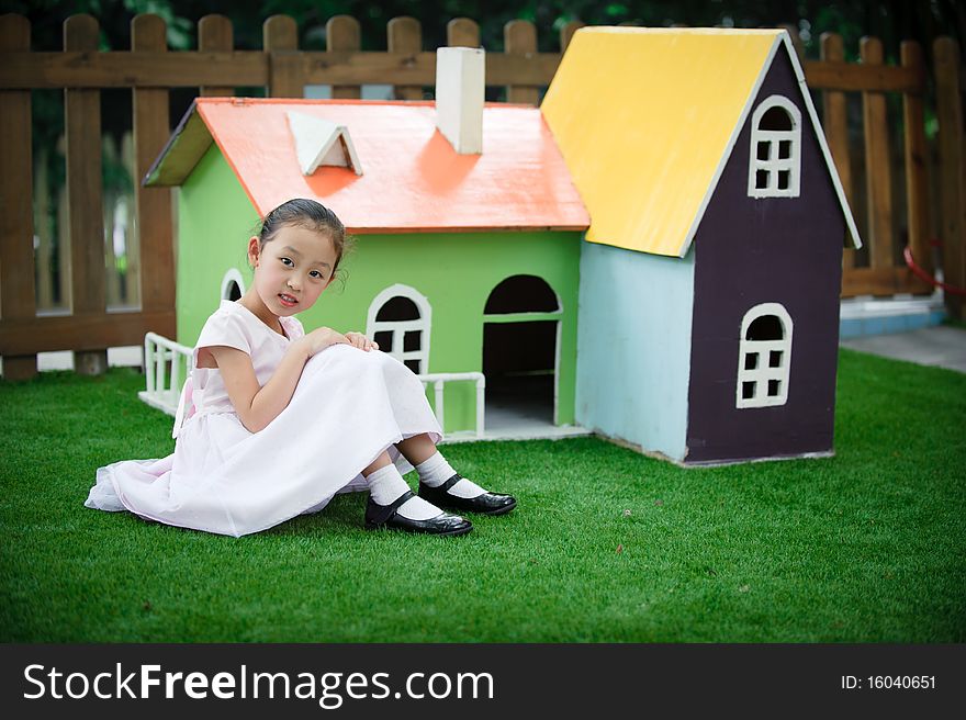 Little asian girl and house like Fairy tale. Little asian girl and house like Fairy tale.