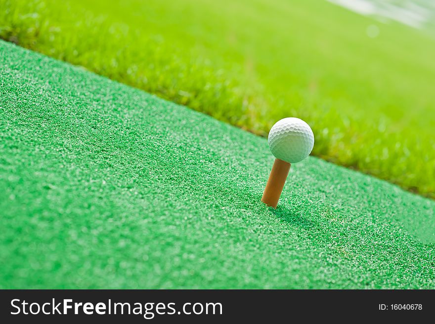 Golf in green grass background. Golf in green grass background.