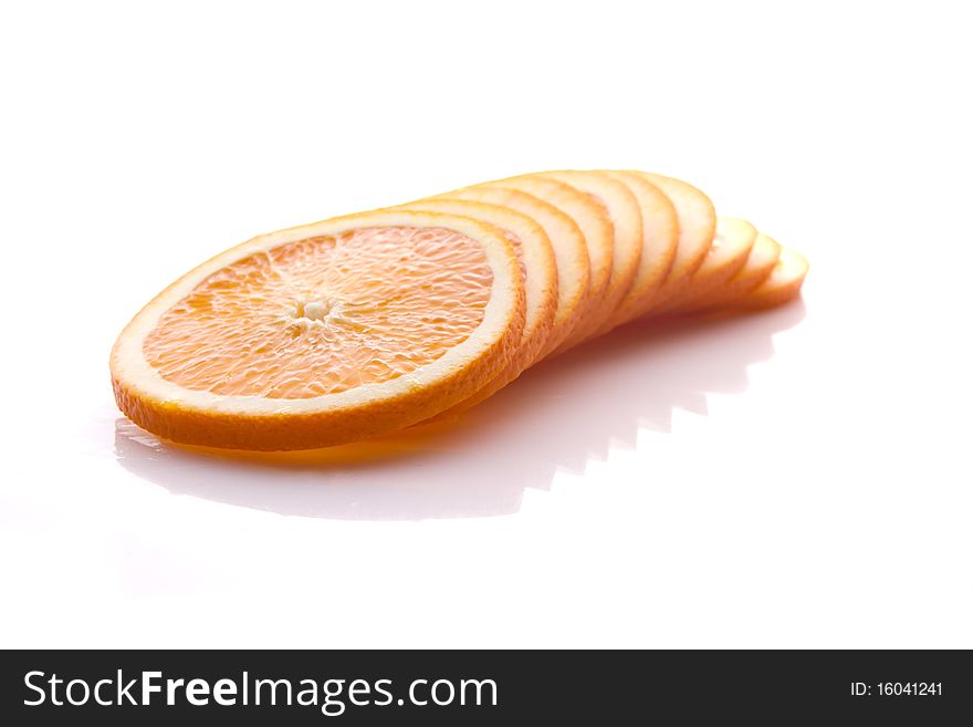 Sliced orange on a white. Sliced orange on a white