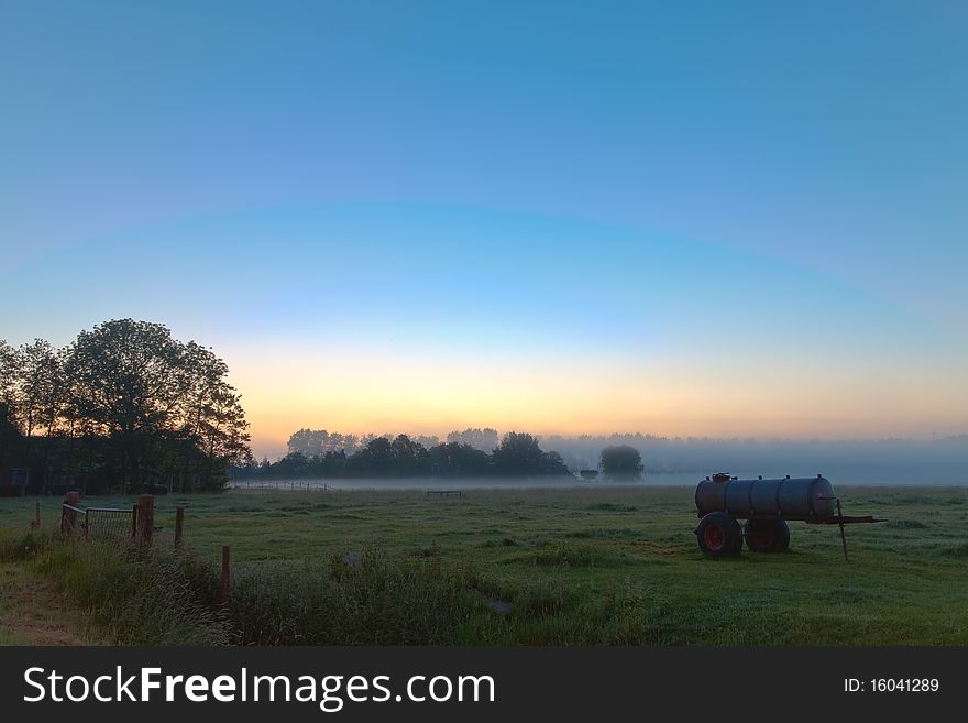 Sunrise in the countryside with morning mist