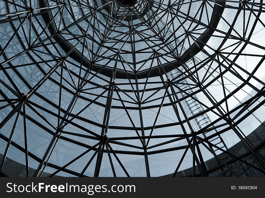 The skeletal construction of a glass cone roof. Singapore. The skeletal construction of a glass cone roof. Singapore