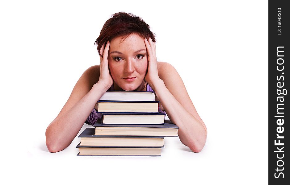 Senior high school student in uniform with documents is laying on the stack of book. Senior high school student in uniform with documents is laying on the stack of book.