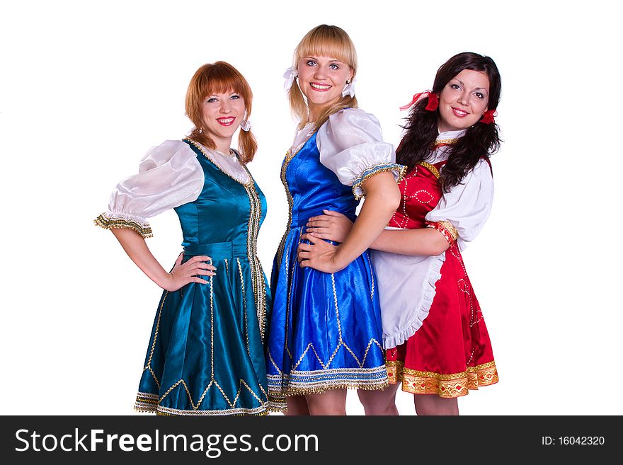 Three German/Bavarian girl s with a traditional Oktoberfest Ma?krug. Smiling woman in Bavarian drindl. Three German/Bavarian girl s with a traditional Oktoberfest Ma?krug. Smiling woman in Bavarian drindl