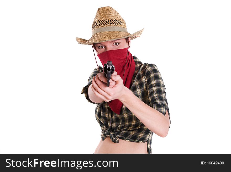 Super sexy rodeo cowgirl in torn jeans, boots and cowboyhat. Portrait of Cowboy Holding Gun Up.