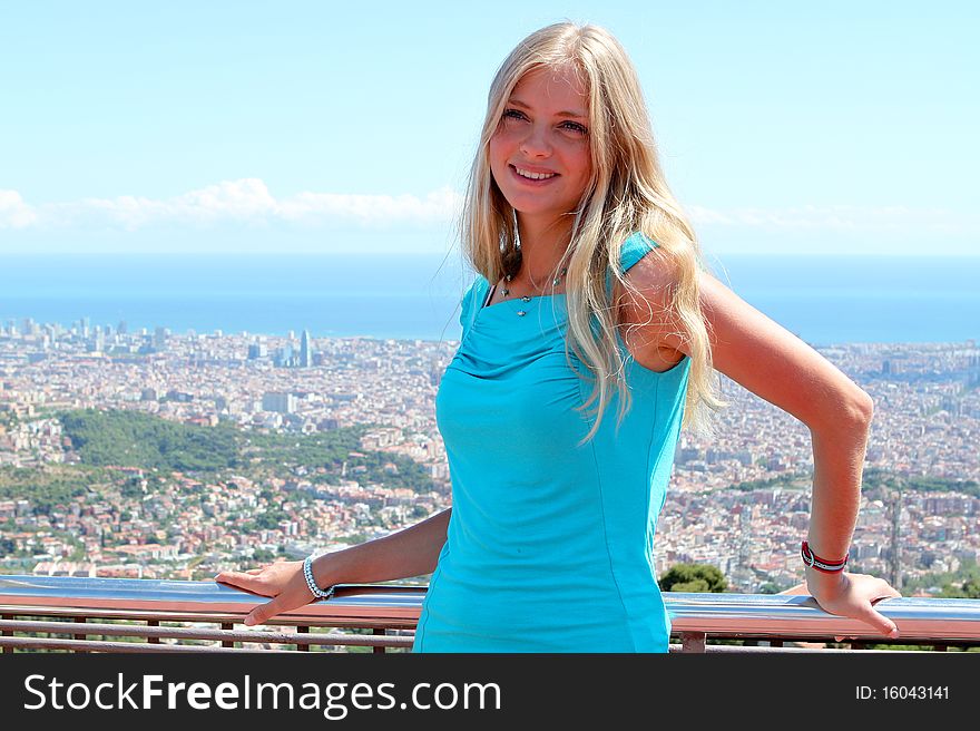 Portrait of a smiling girl on top of the building in Spain. Portrait of a smiling girl on top of the building in Spain.