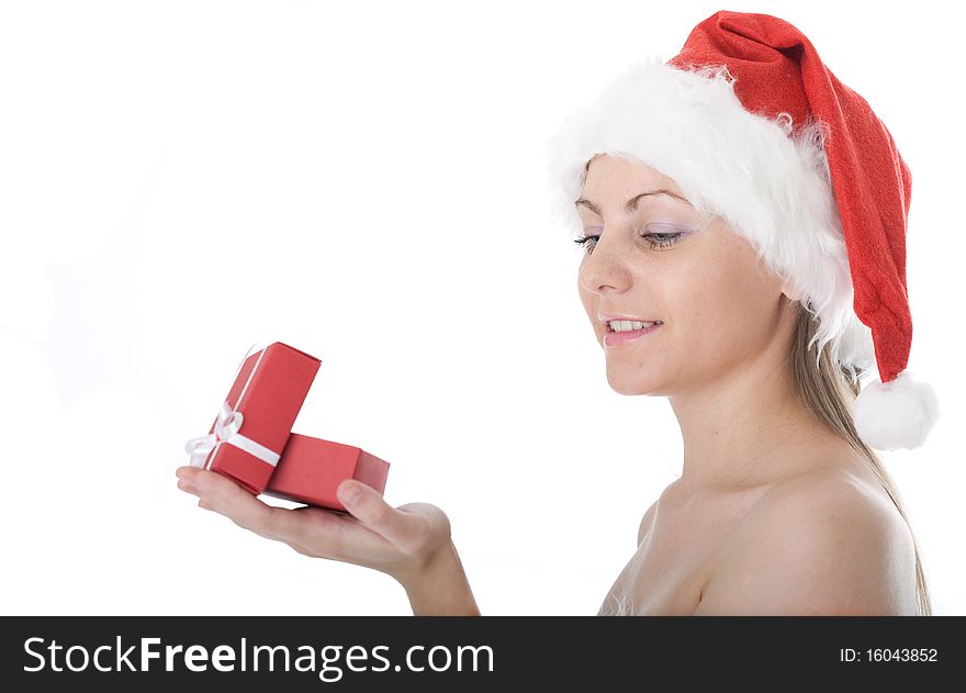 Beauty woman in  Santa hat with present isolated on white