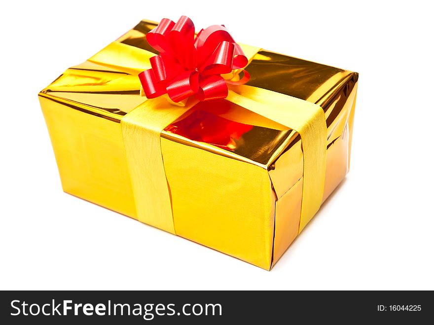 Golden gift box with bow