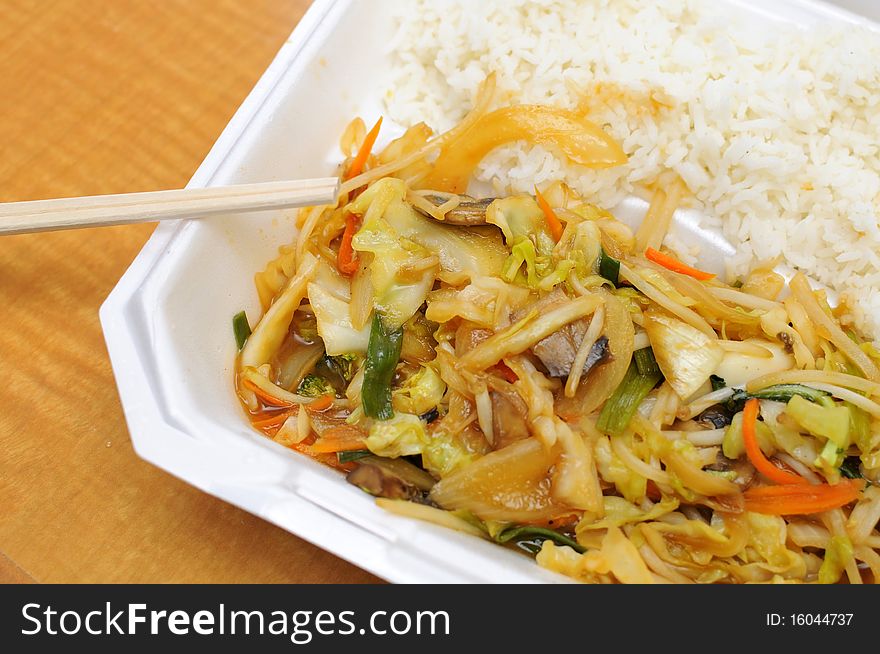 Asian style mixed vegetable set meal with rice. Suitable for concepts such as diet and nutrition, healthy lifestyle, and food and beverage. Asian style mixed vegetable set meal with rice. Suitable for concepts such as diet and nutrition, healthy lifestyle, and food and beverage.