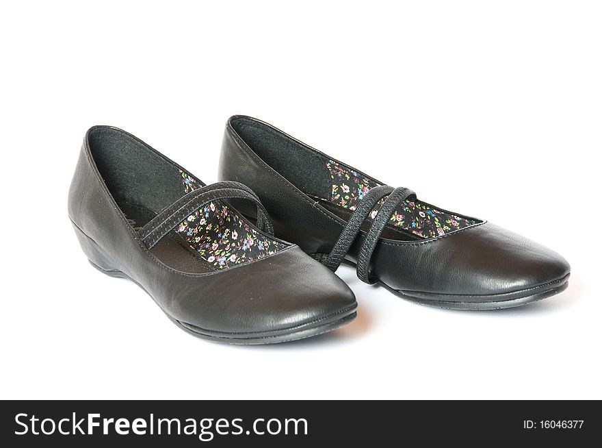 A pair of black woman shoes. A pair of black woman shoes