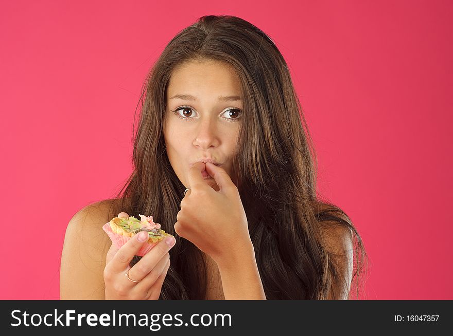 Portrait of a young girl with cream pastry. Portrait of a young girl with cream pastry
