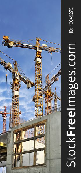 Cranes On Building Site
