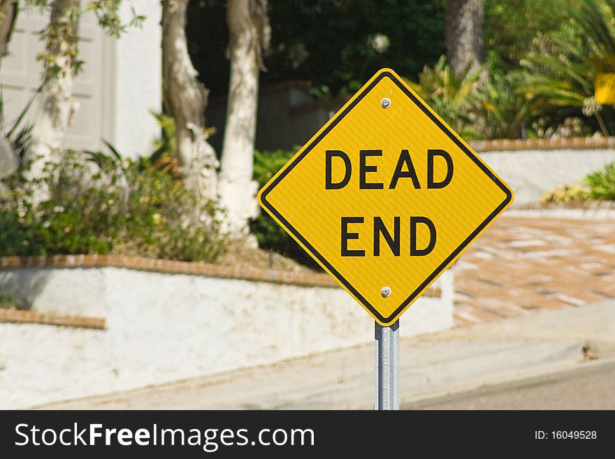 Dead end sign on a residential street.