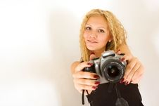 The Young Beautiful Girl With The Camera Stock Photo