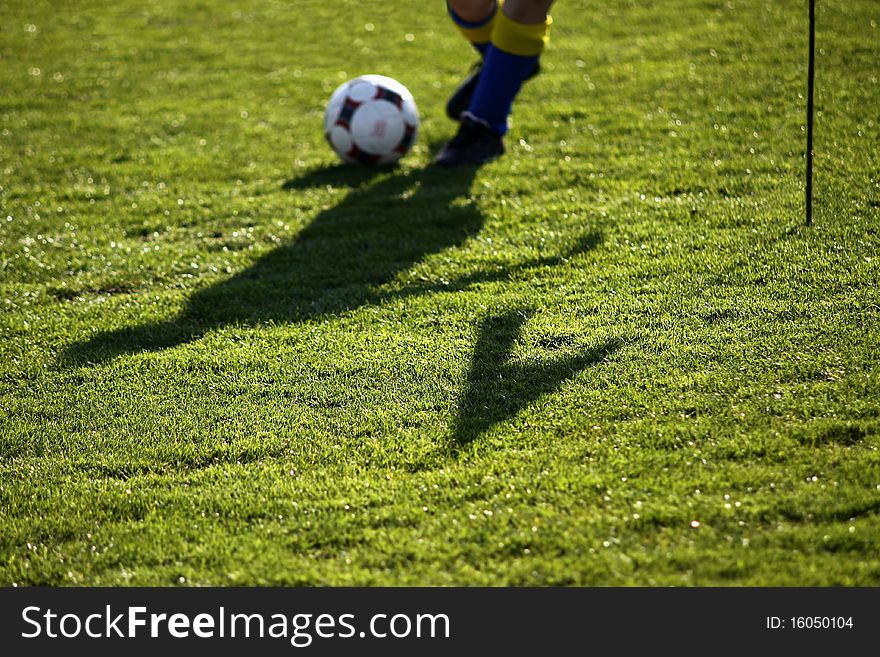 Soccer player putting foot on ball. Soccer player putting foot on ball