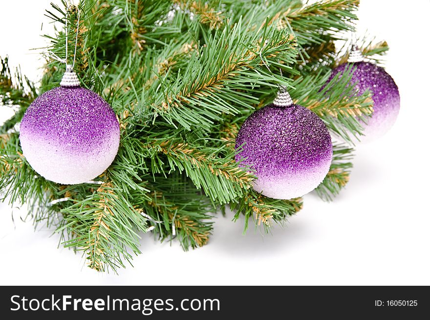 Three gold balls on a Christmas fur-tree. Three gold balls on a Christmas fur-tree