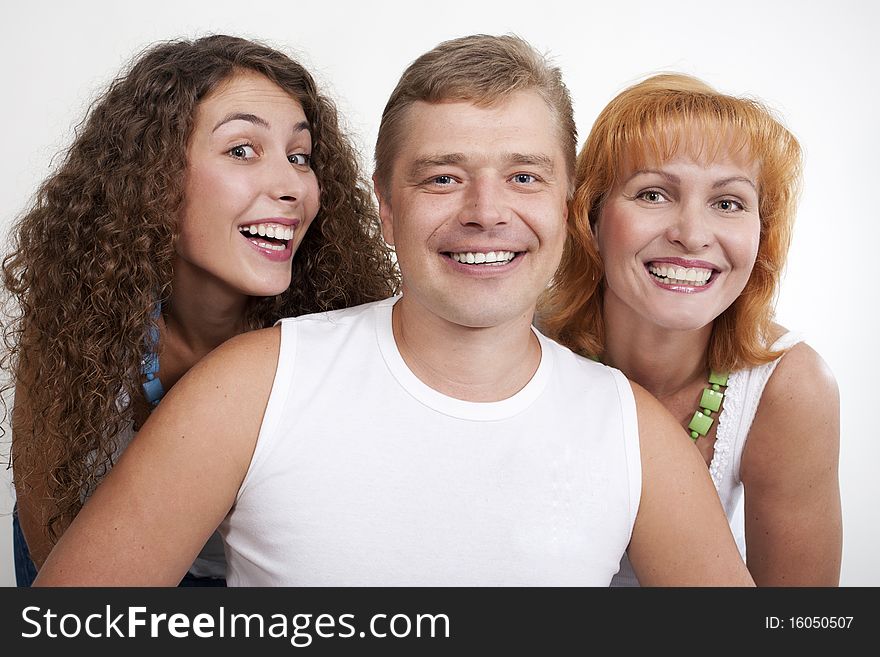 Happy family, parents with their grown-up daughter.