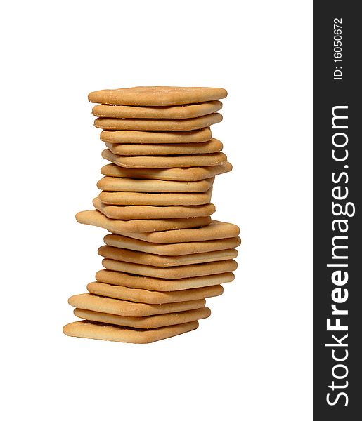 High stack of crackers isolated on white background with clipping path