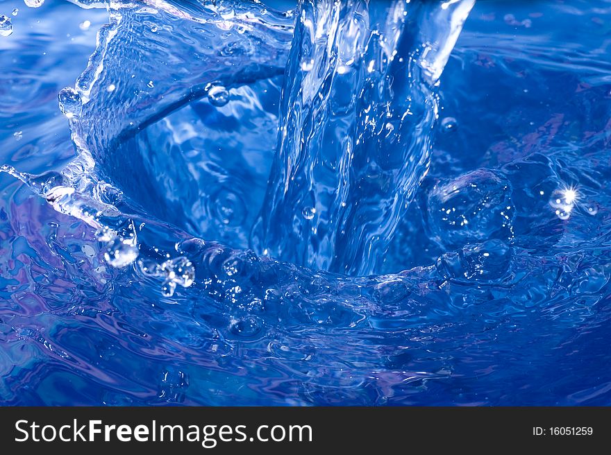 Blue Water drop  on ripple surface