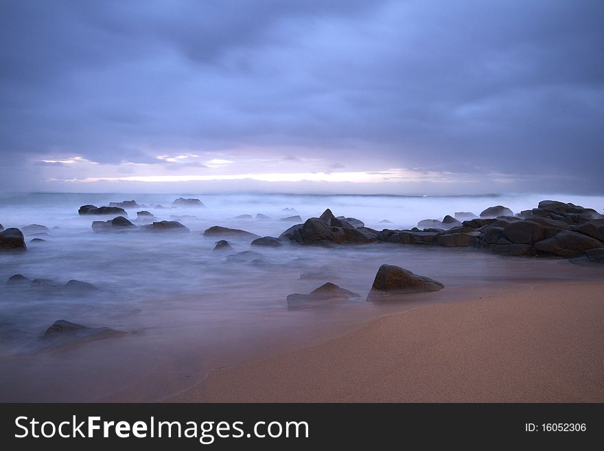 Early Morning Beach Seascape(landscape) of the Main Beach in Ballito South Africa. The shot is a long exposure to get the misty effect of the water. Early Morning Beach Seascape(landscape) of the Main Beach in Ballito South Africa. The shot is a long exposure to get the misty effect of the water.