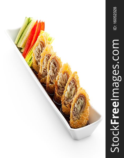 Deep Fried Pork Roll with Vegetables and Sauce. Deep Fried Pork Roll with Vegetables and Sauce