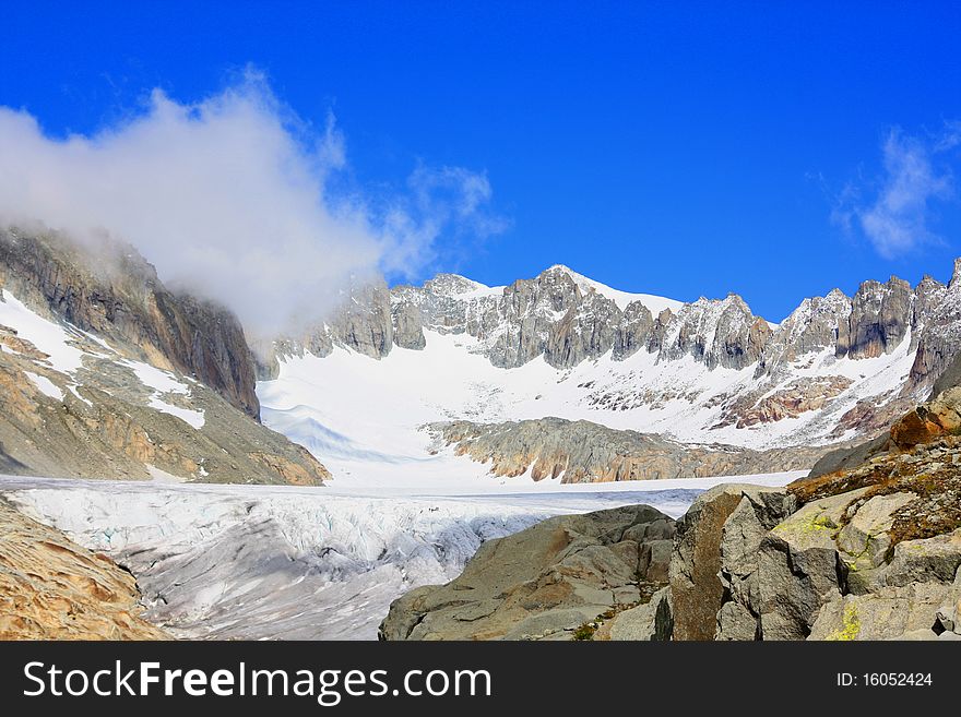 Glacier with Snow capped mountains