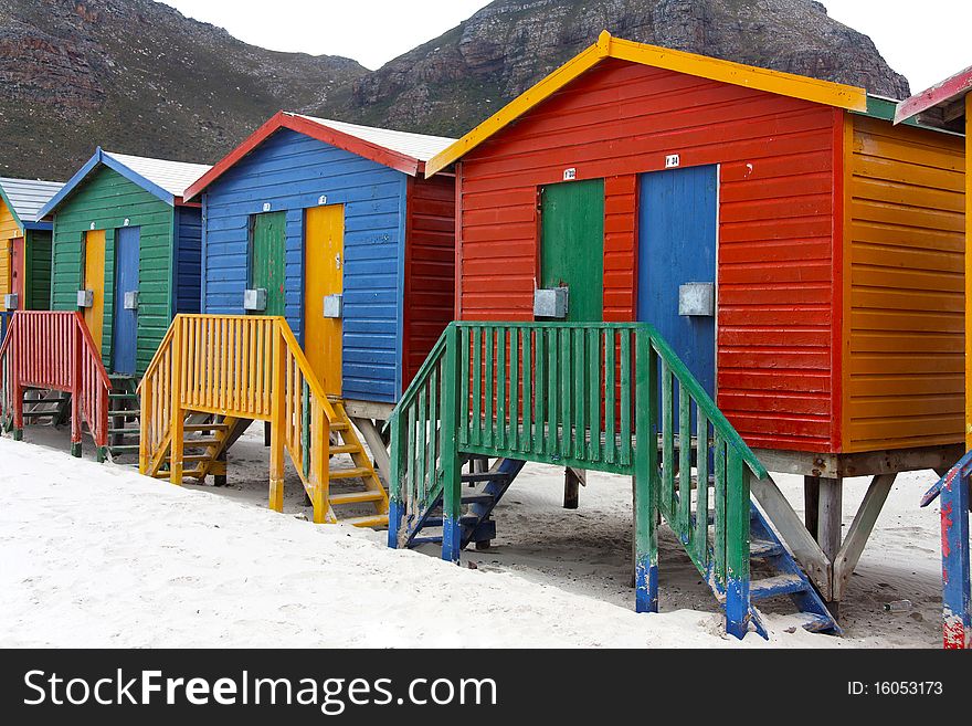 Colorful bath houses at the seaside of Cape Town