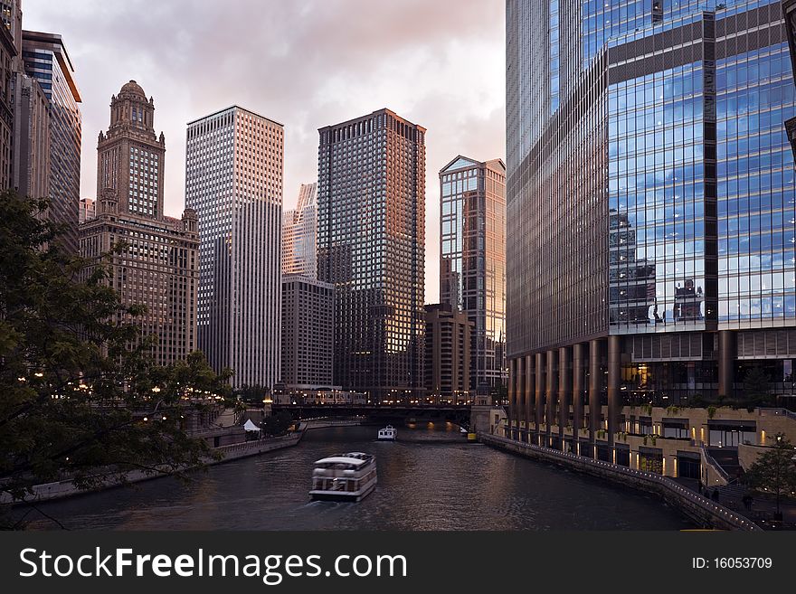Sunset by Chicago River in downtown Chicago. Sunset by Chicago River in downtown Chicago.