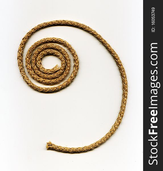Spiral rope made from natural fibers on the white background