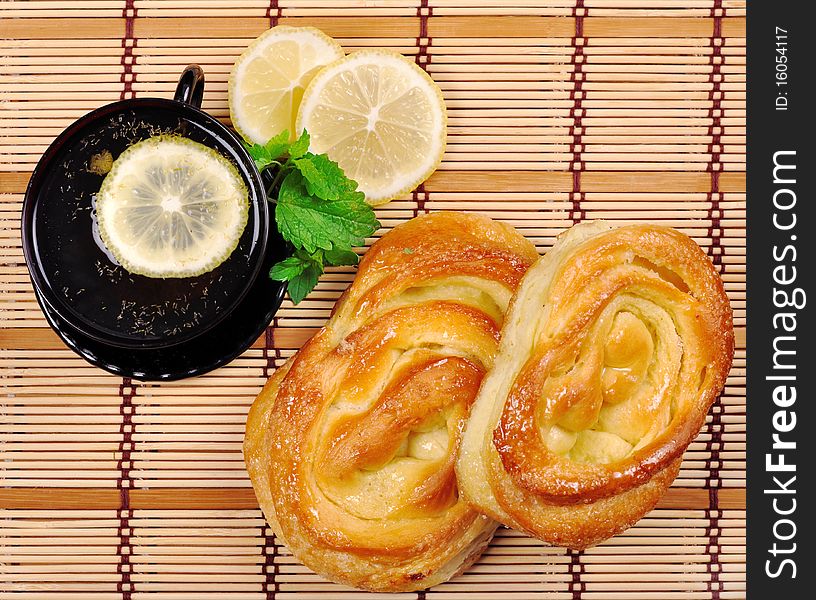 Sweet Buns, Lemon And Tea