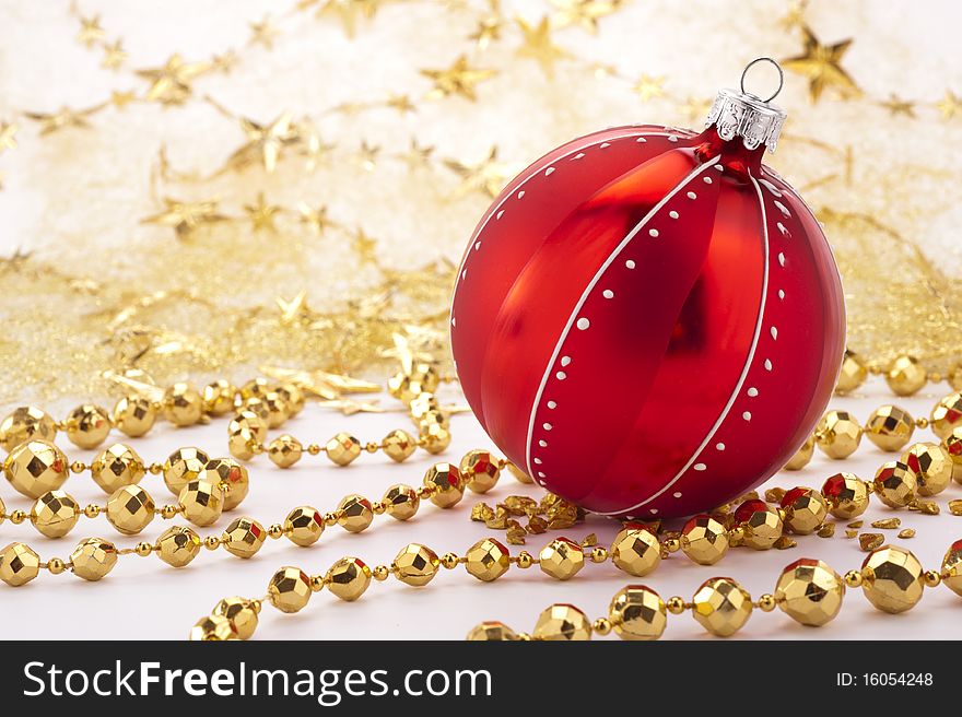 Christmas decoration with red ball and golden stars