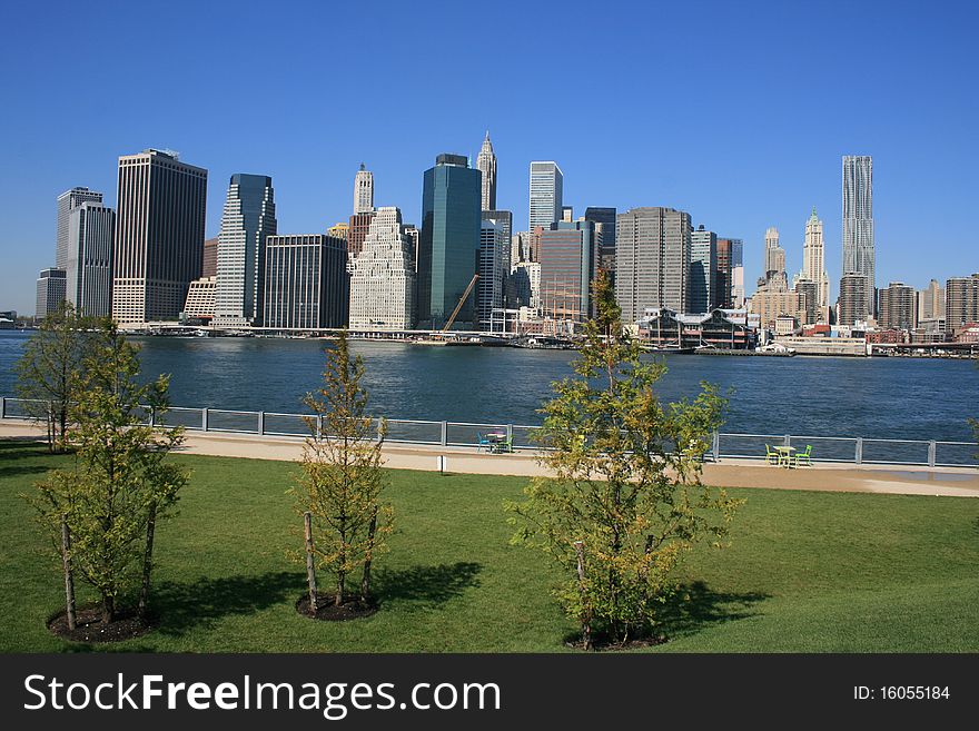 Lower Manhattan skyline and East River as seen from Brooklyn Bridge Park. Lower Manhattan skyline and East River as seen from Brooklyn Bridge Park.