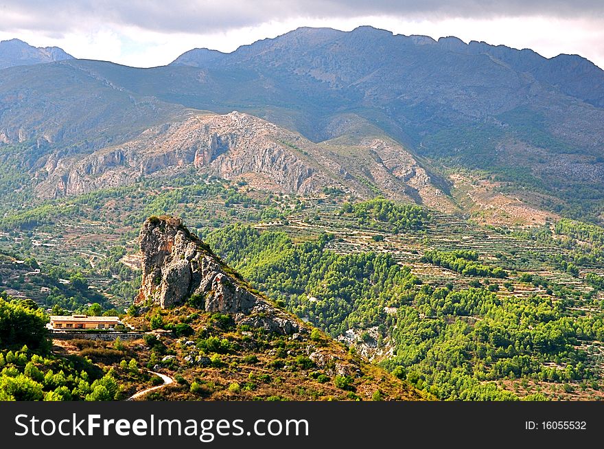Spain Guadalest mountain sun sky ridge protrusion landscape painting Village