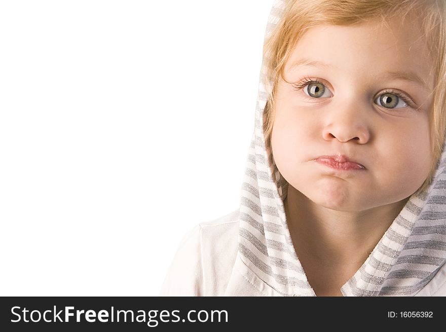 Little cute girl making a funny face close-up on white background