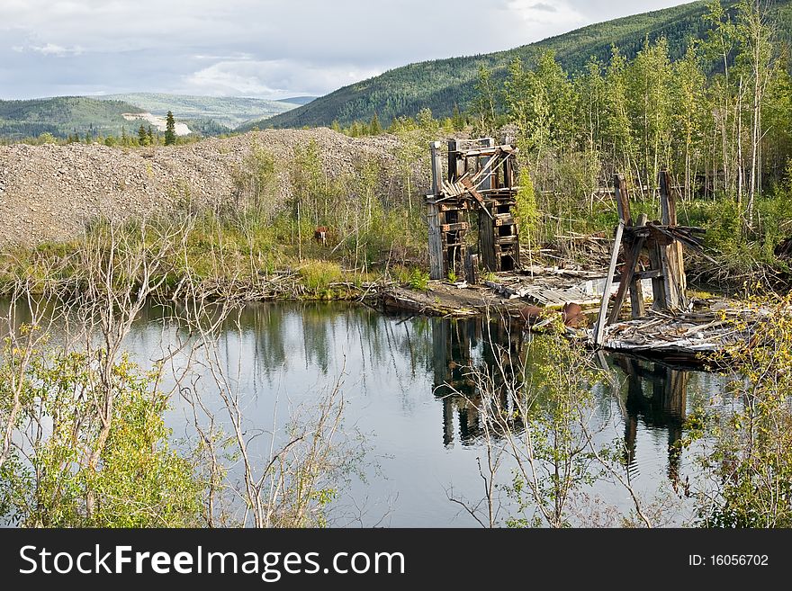 The remains of delelict mining dredge outside of Dawson City, Yukon. The remains of delelict mining dredge outside of Dawson City, Yukon