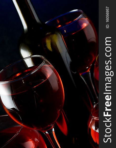 Red wine on the black background