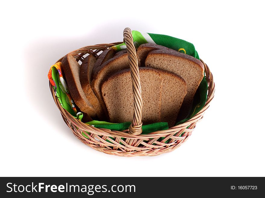 Basket with bread isolated on white background