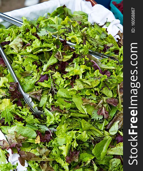 Organic Salad Mix on display at a farmer's market