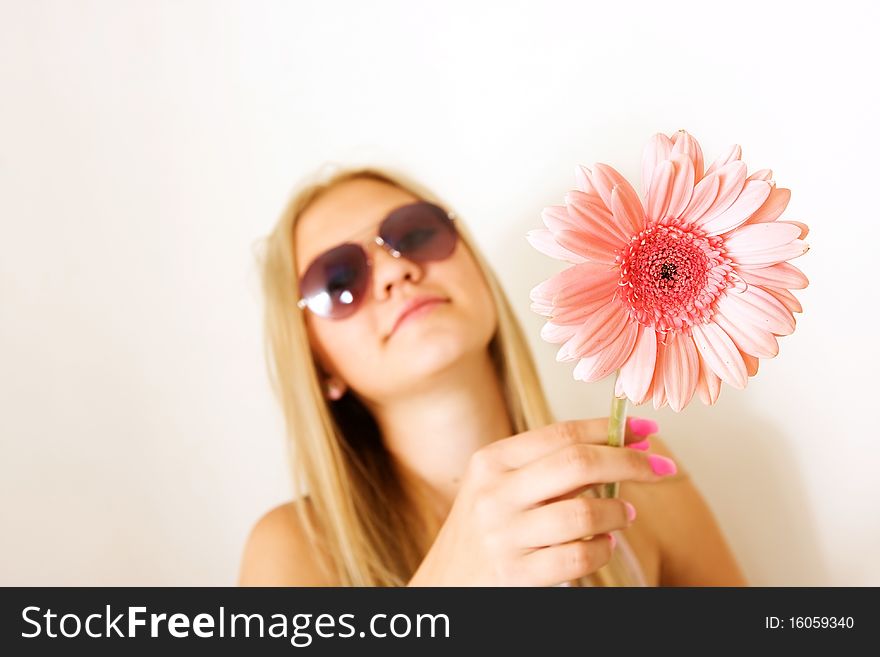 Beautiful young pretty woman with flower