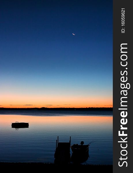 A beautiful sunrise spectacle in the Graham Lake, ME. A beautiful sunrise spectacle in the Graham Lake, ME