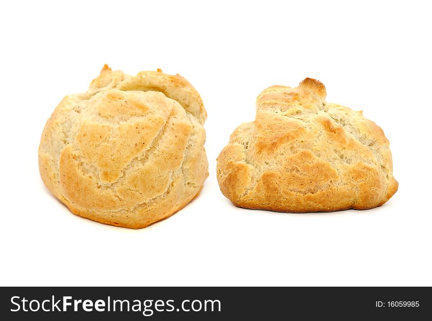 A set of fresh-baked homemade buns isolated on a white background. A set of fresh-baked homemade buns isolated on a white background