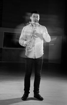 Young Handsome Man Playing Music On Saxophone Stock Photos Young Handsome Man Playing Music On Saxophone Stock Photos