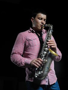 Young Handsome Man Playing Music On Saxophone Royalty Free Stock Photography Young Handsome Man Playing Music On Saxophone Royalty Free Stock Photography